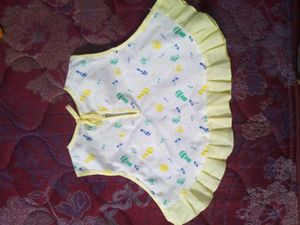 Cute Baby Girl's White Bib with Yellow Trim