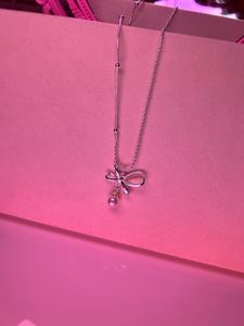 Delicate Bow Pendant Necklace