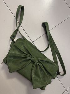Green Clutch Bag with Bow Detail