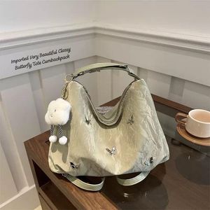 Chic Butterfly Accent Hobo Bag