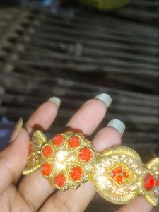 Golden Bangle with Red Stones