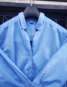 ​Three-Quarter Sleeve Button-Up Shirt