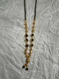 Elegant golden colour Mangalsutra with Black Beads