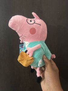 Daddy Pig from Peppa holding his briefcas