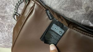 Chic Brown Shoulder Bag with Chain Accent