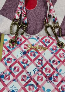 Chic Floral Handbag with Chain Straps