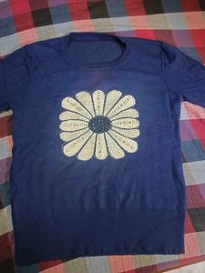 Chic Blue Blouse with Floral Embellishment