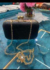Elegant Black Quilted Clutch Bag with Gold Chain
