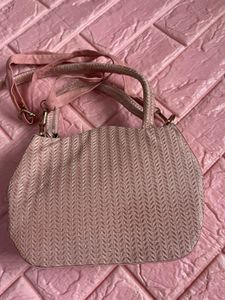 Chic Pink Textured Handbag