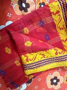Vibrant Red Saree with Floral Motifs
