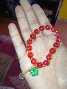 Red Beaded Bracelet with Butterfly Charm