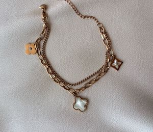 ROSE GOLD DOUBLE CHAIN CLOVER CHARMS BRACELET