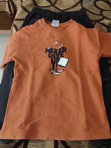 Orange Graphic T-Shirt and black pant