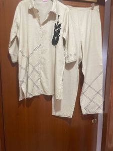 Elegant Beige Kurta Set with Black embroidery