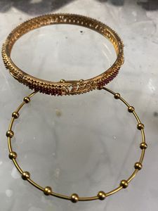 Elegant Gold Bangles with Red Stones