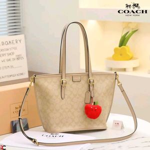 COACH* *TAXI TOTE BAG 21 IN SIGNATURE CANVAS*