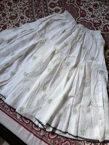 White Skirt with Green Floral Embroidery