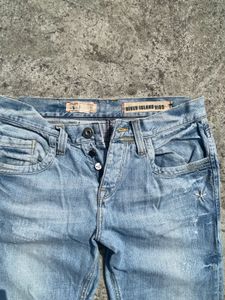 Distressed Light Wash Flare Jeans