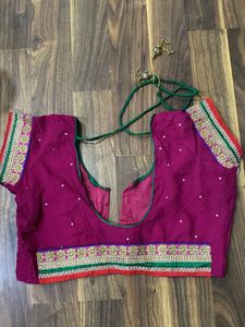 Elegant Heavy Green And Pink Embellished Saree