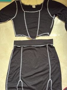 black skirt and top
