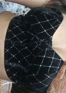 Black geometric tube neck corset top