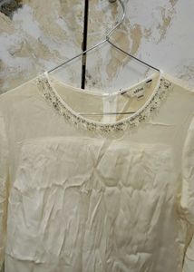 Elegant Beaded Cream top