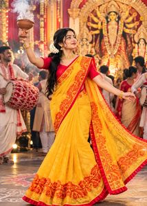 Vibrant Yellow Saree with Red Border