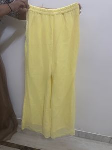 Elegant Yellow Kurta Set with Intricate Work