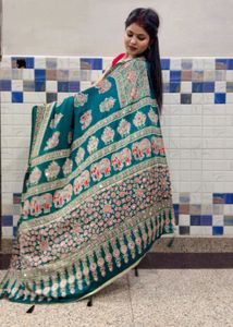 Elegant Teal Saree with Elephant Print