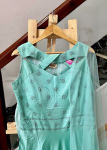 Brand new Stunning Teal Embroidered Gown