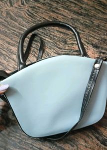GG Blue Scatch Sling Bag.
