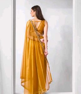 Elegant Yellow Saree with Mirror Work Border