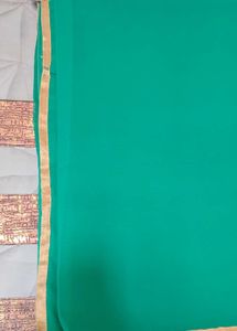 Elegant Green Saree with Gold Border