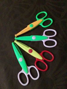 set of 4 designer scissor
