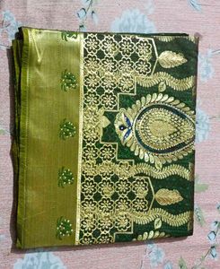 Elegant Green Saree with Gold Border