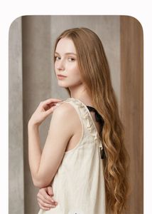 Chic Cream Ruffled Top with Bow Detail