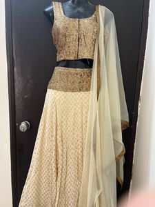 Off white Lengha Choli With Golden Shimmer Blouse