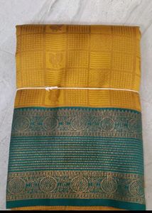 Vibrant Yellow Saree with Teal Border