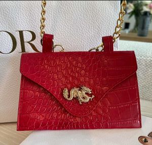 Red Embossed Dragon Clutch