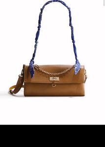 Chic Brown Shoulder Bag with Scarf Accent