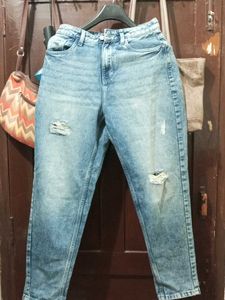 Distressed Blue Denim Jeans
