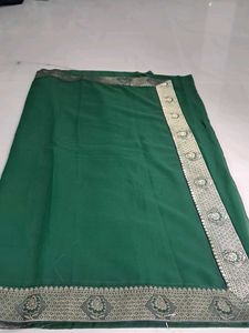 Elegant Green Saree with Gold Border