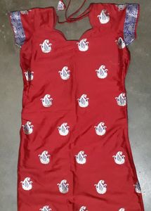Maroon- Red Pure Benarasi Silk Churider / Kurti.For Festive Look,Regular ,Office,College Use.Silver Kolka Motifs All Over The Body ,Small Sleves,side Slit,knee Length