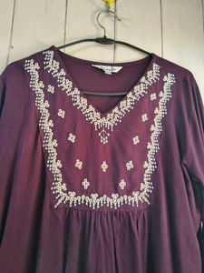 burgundry short kurti with minor flaw