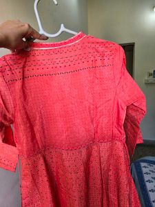 Elegant Coral Kurta with Intricate Print