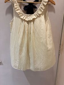 Chic Cream Ruffled Top with Bow Detail