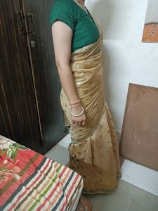 Elegant Golden Saree with Unique Print