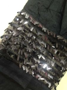 Elegant Black Kurta with Pink dhoti salwar.