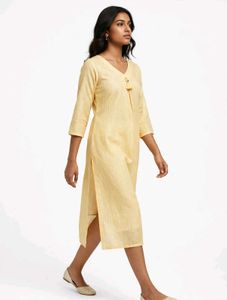 Elegant Yellow Striped Kurta with Tassel Detail