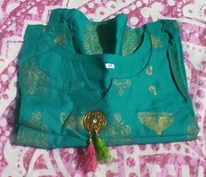 Elegant Green Top with Gold Detailing